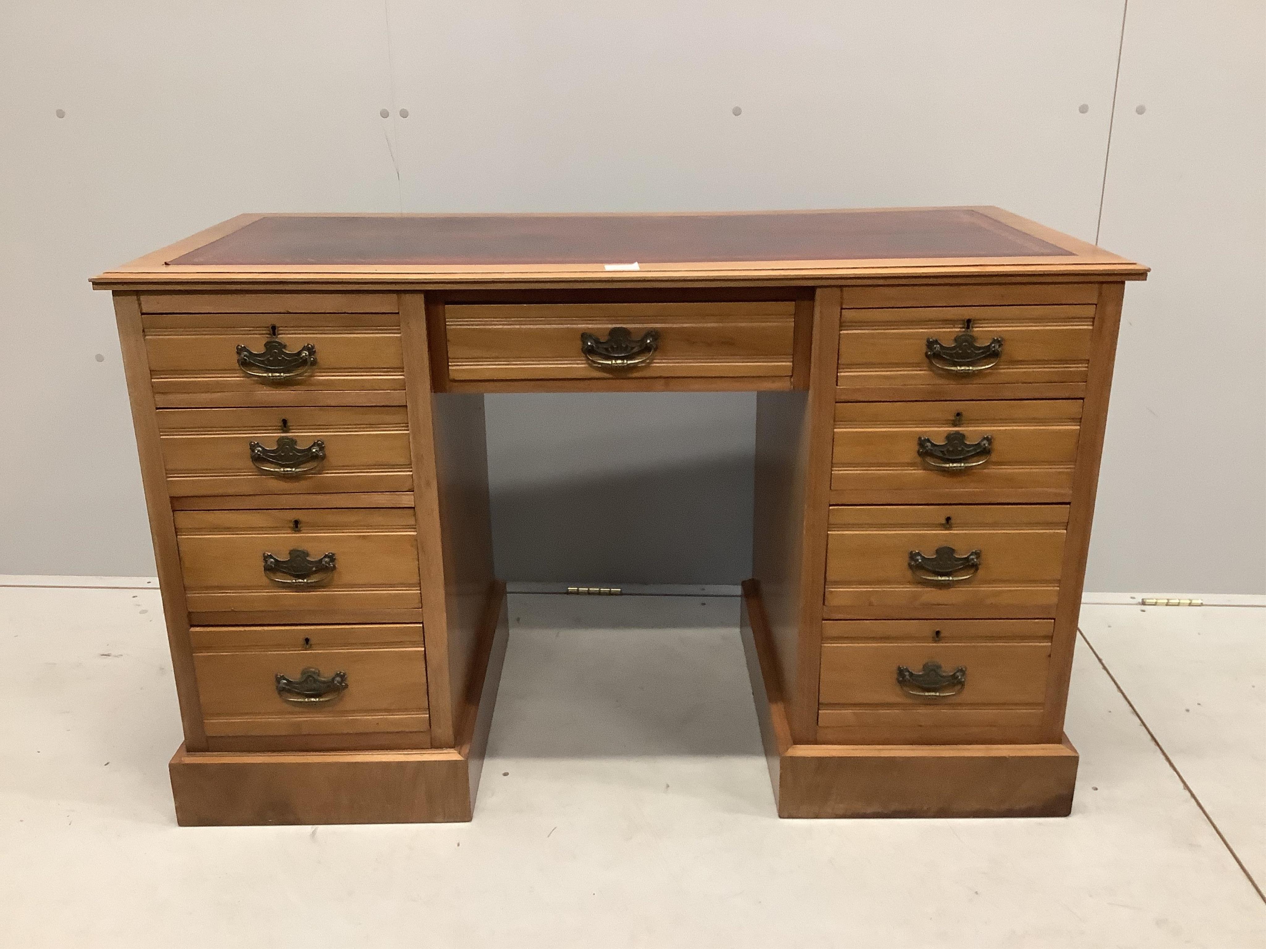 A late Victorian walnut kneehole desk, width 122cm, depth 56cm, height 75cm. Condition - good